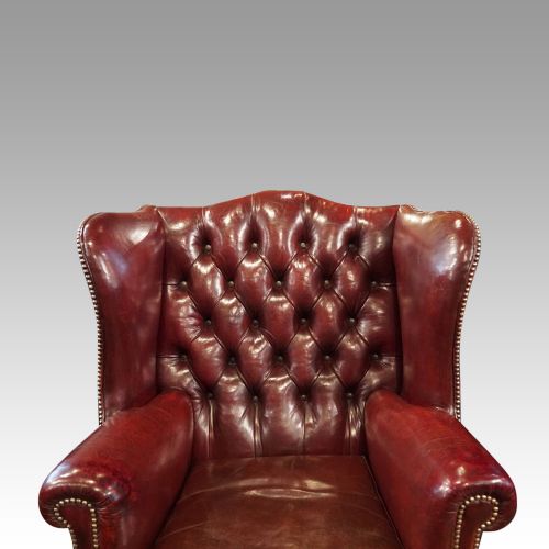 fig 4. Pair of George VI leather wing chairs