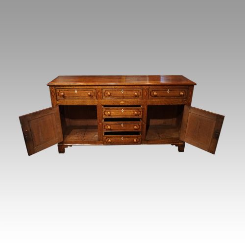 fig 4. Antique oak inlaid dresser base