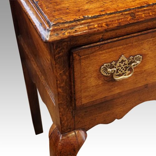 fig 2. George III oak cabriole leg dresser