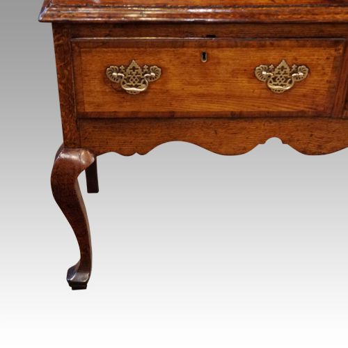 fig 6. George III oak cabriole leg dresser