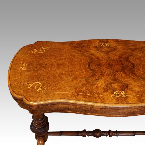 fig 3. Victorian inlaid walnut serpentine card table