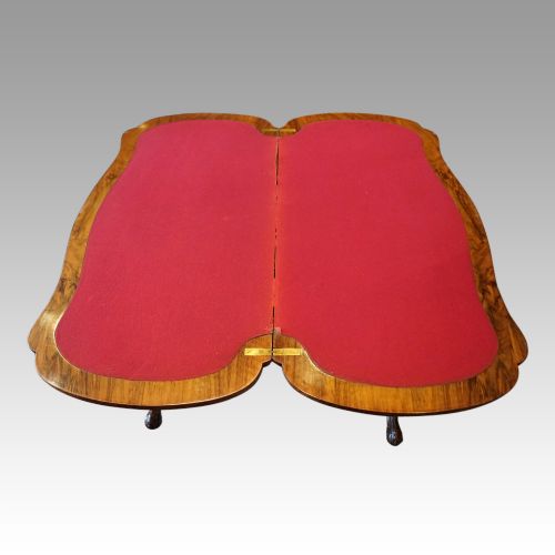 fig 4. Victorian inlaid walnut serpentine card table