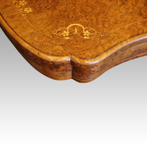 fig 6. Victorian inlaid walnut serpentine card table