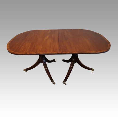 fig 6. George V mahogany pedestal dining table