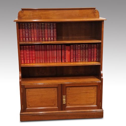 fig 4. Pair of Edwardian walnut open bookcases