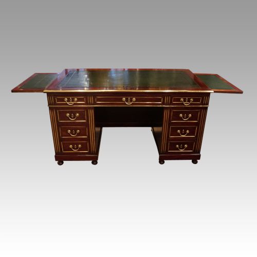 fig 3. Antique brass mounted mahogany desk