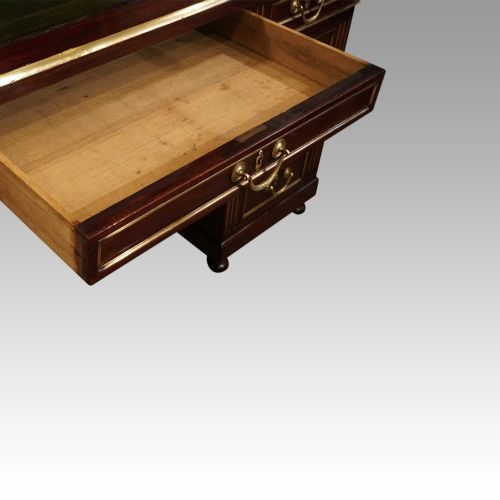 fig 7. Antique brass mounted mahogany desk