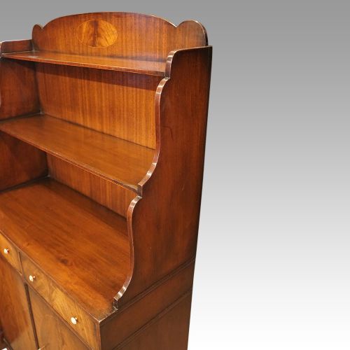 fig 1. George V mahogany waterfall bookcase