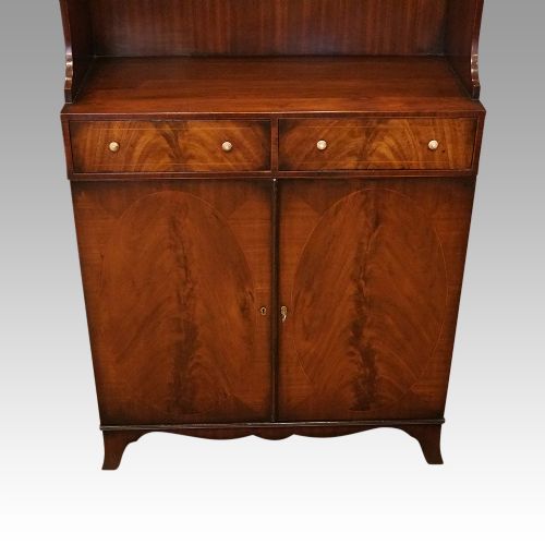 fig 2. George V mahogany waterfall bookcase