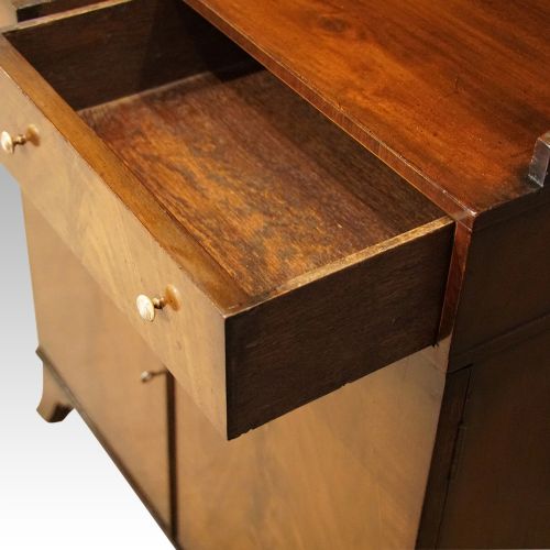 fig 3. George V mahogany waterfall bookcase