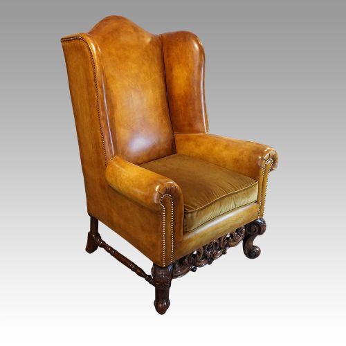 fig 1. Pair of leather club walnut wingchairs