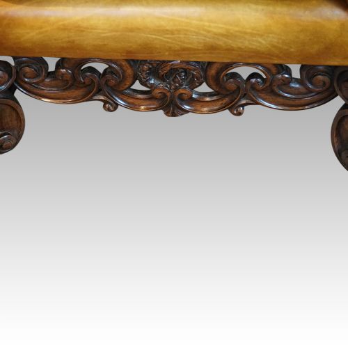fig 2. Pair of leather club walnut wingchairs