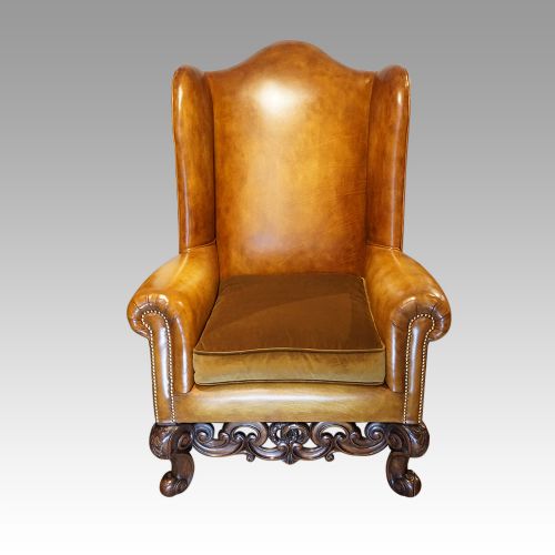 fig 3. Pair of leather club walnut wingchairs