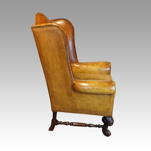 fig 6. Pair of leather club walnut wingchairs