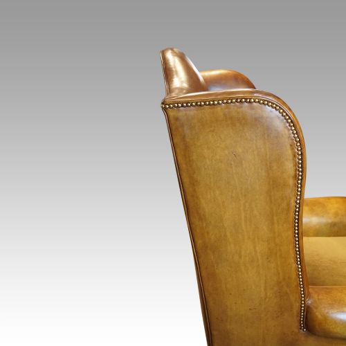 fig 8. Pair of leather club walnut wingchairs