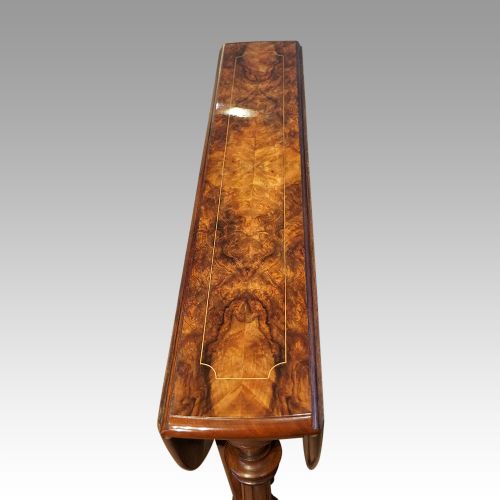 fig 6. Victorian inlaid walnut Sutherland table
