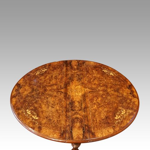 fig 7. Victorian inlaid walnut Sutherland table
