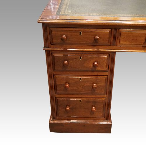 fig 1. Edwardian walnut pedestal desk