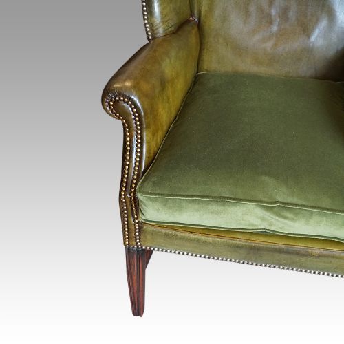 fig 2. Antique leather wing chair