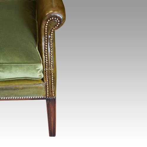fig 3. Antique leather wing chair