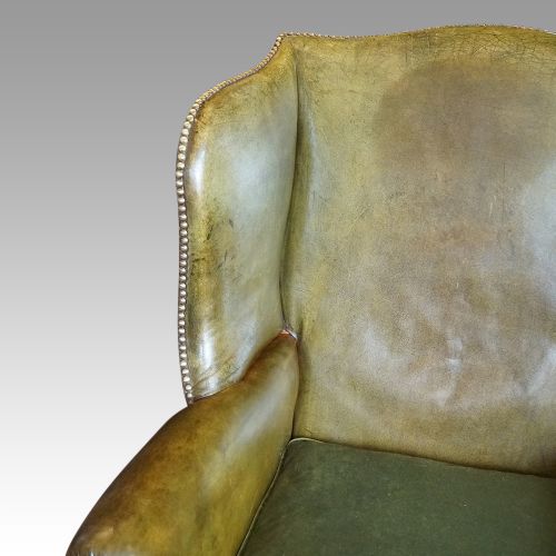 fig 5. Antique leather wing chair