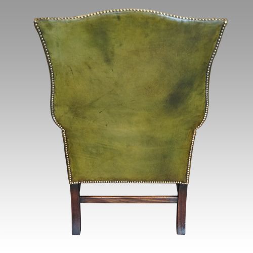 fig 6. Antique leather wing chair