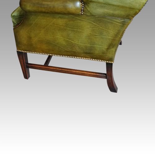 fig 8. Antique leather wing chair