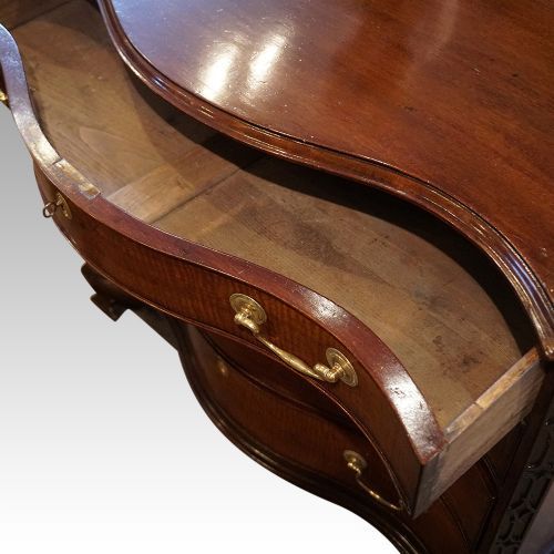 fig 4. Georgian style mahogany serpentine chest