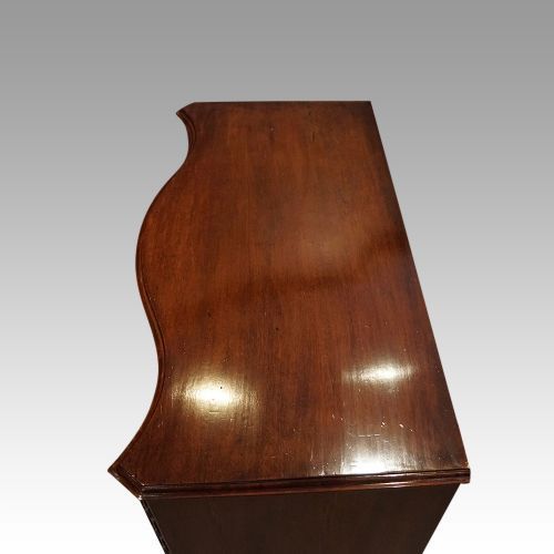 fig 6. Georgian style mahogany serpentine chest