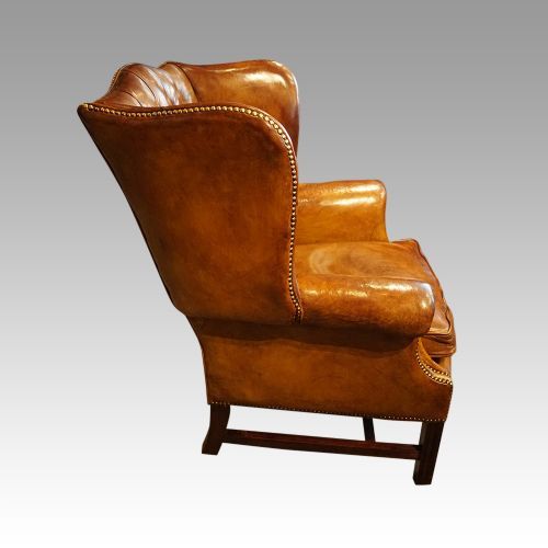 fig 7. George VI leather button back wingchair