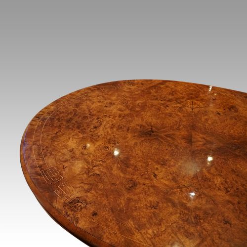 fig 3. Victorian inlaid walnut oval loo table
