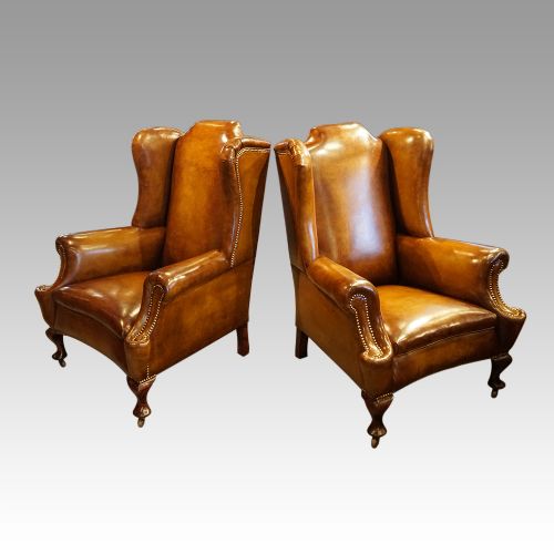 fig 1. Pair of Edwardian leather wing chairs