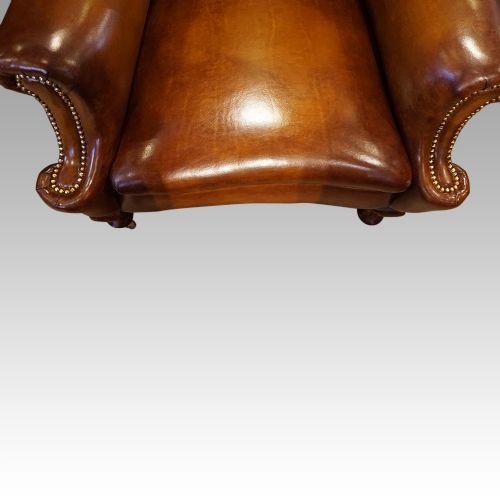 fig 4. Pair of Edwardian leather wing chairs