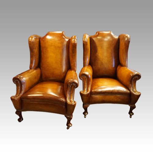 fig 5. Pair of Edwardian leather wing chairs