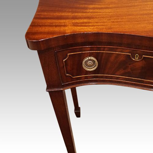 fig 5. George VI serpentine mahogany serving table
