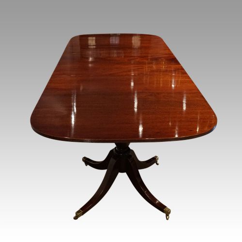 fig 3. George V mahogany twin pillar dining table