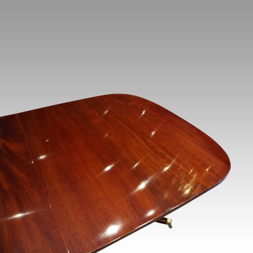 fig 4. George V mahogany twin pillar dining table