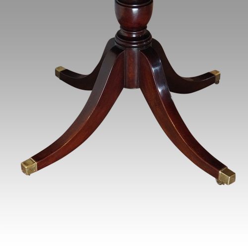 fig 6. George V mahogany twin pillar dining table