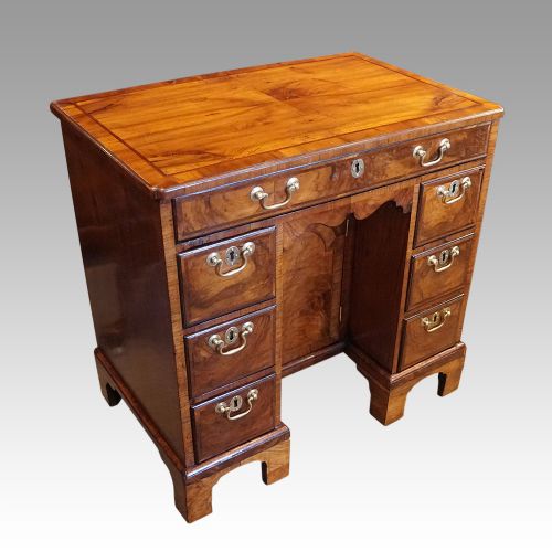 fig 2. Antique walnut kneehole