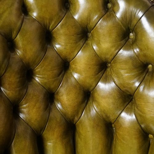 fig 3. Victorian button back leather easy chair