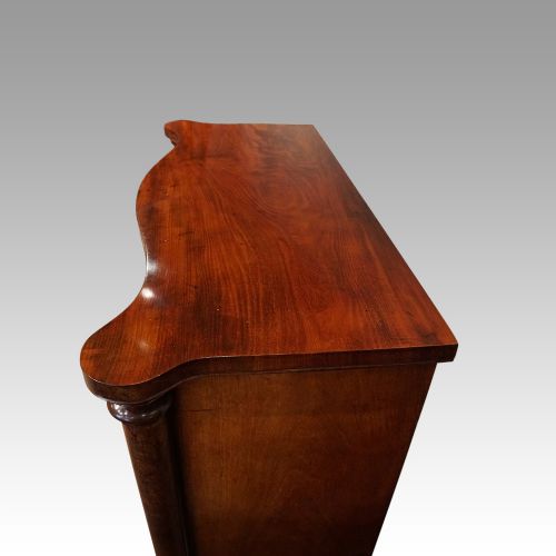 fig 6. Victorian mahogany serpentine chest