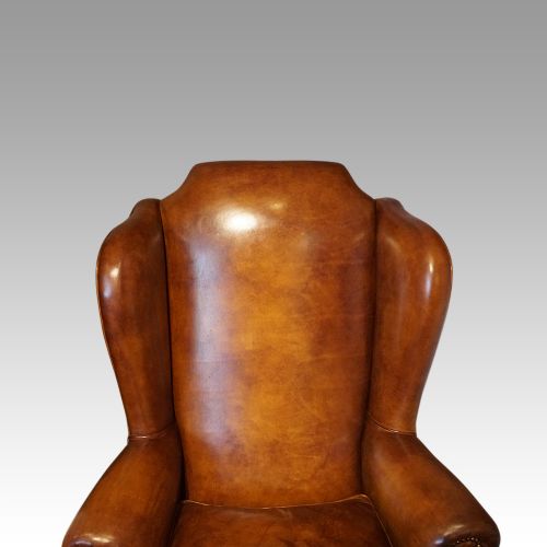 fig 1. Queen Anne style tan leather wingchair