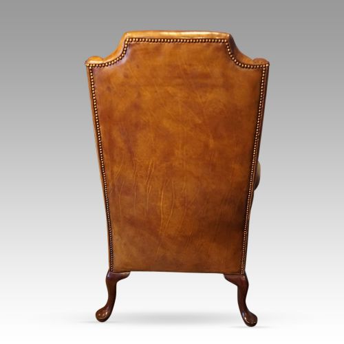 fig 5. Queen Anne style tan leather wingchair