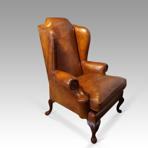 fig 6. Queen Anne style tan leather wingchair