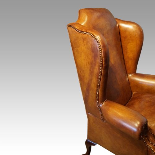 fig 8. Queen Anne style tan leather wingchair