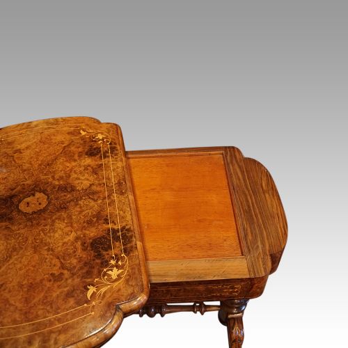 fig 7. Victorian walnut games and sewing table