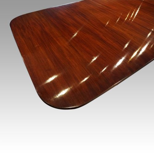fig 7. George V mahogany twin pillar dining table