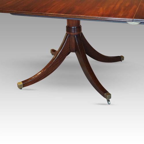 fig 9. George V mahogany twin pillar dining table