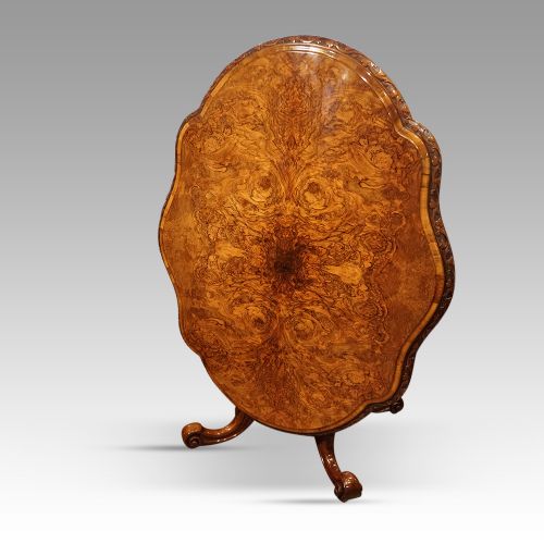 fig 6. Victorian shaped walnut loo table