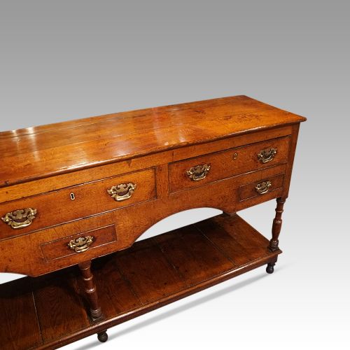 fig 3. Antique long oak pot board dresser